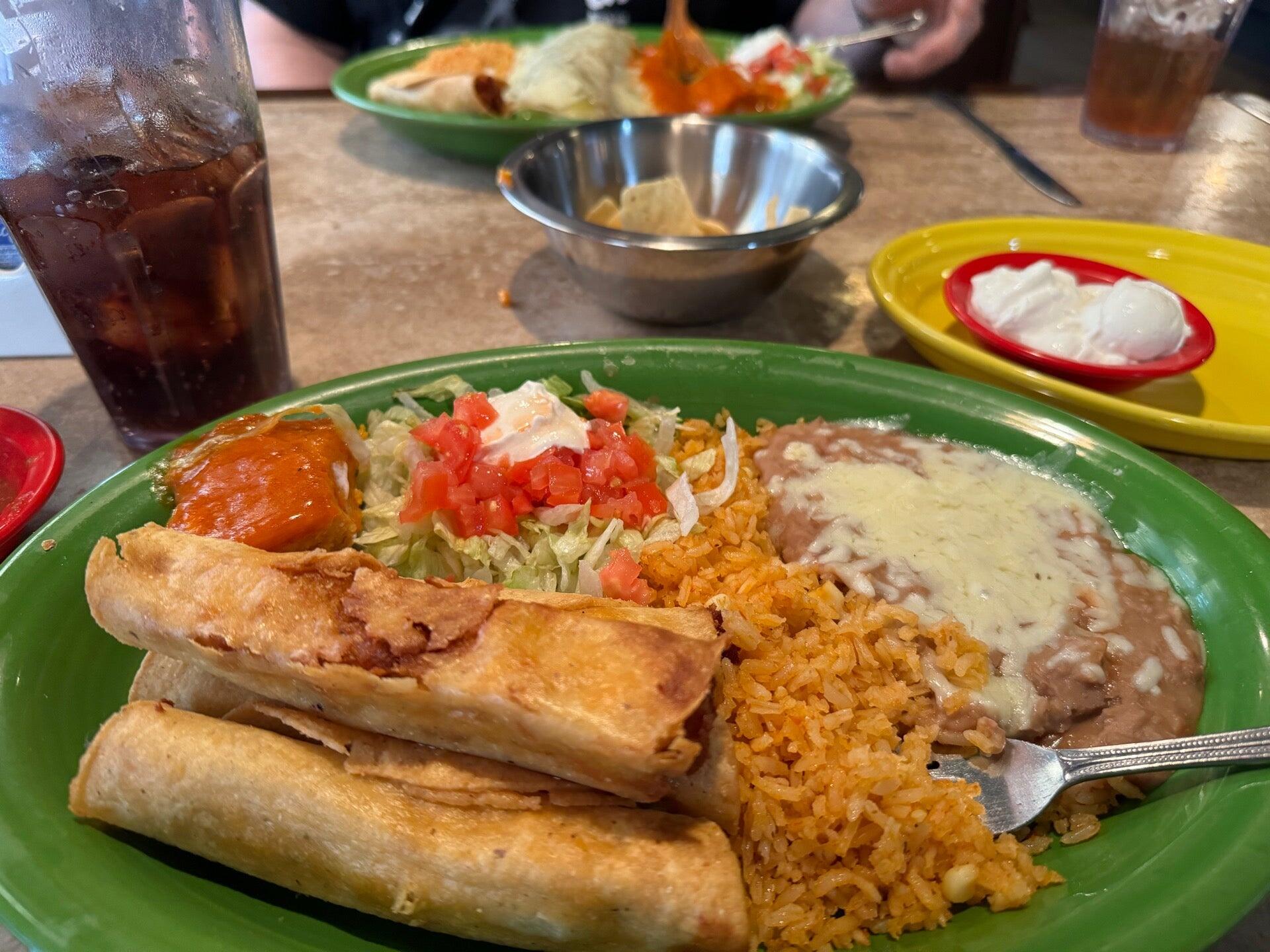 Dos De Oros signature dishes Tex-Mex BurritoFajita BurritoChicken and Steak Fajitas